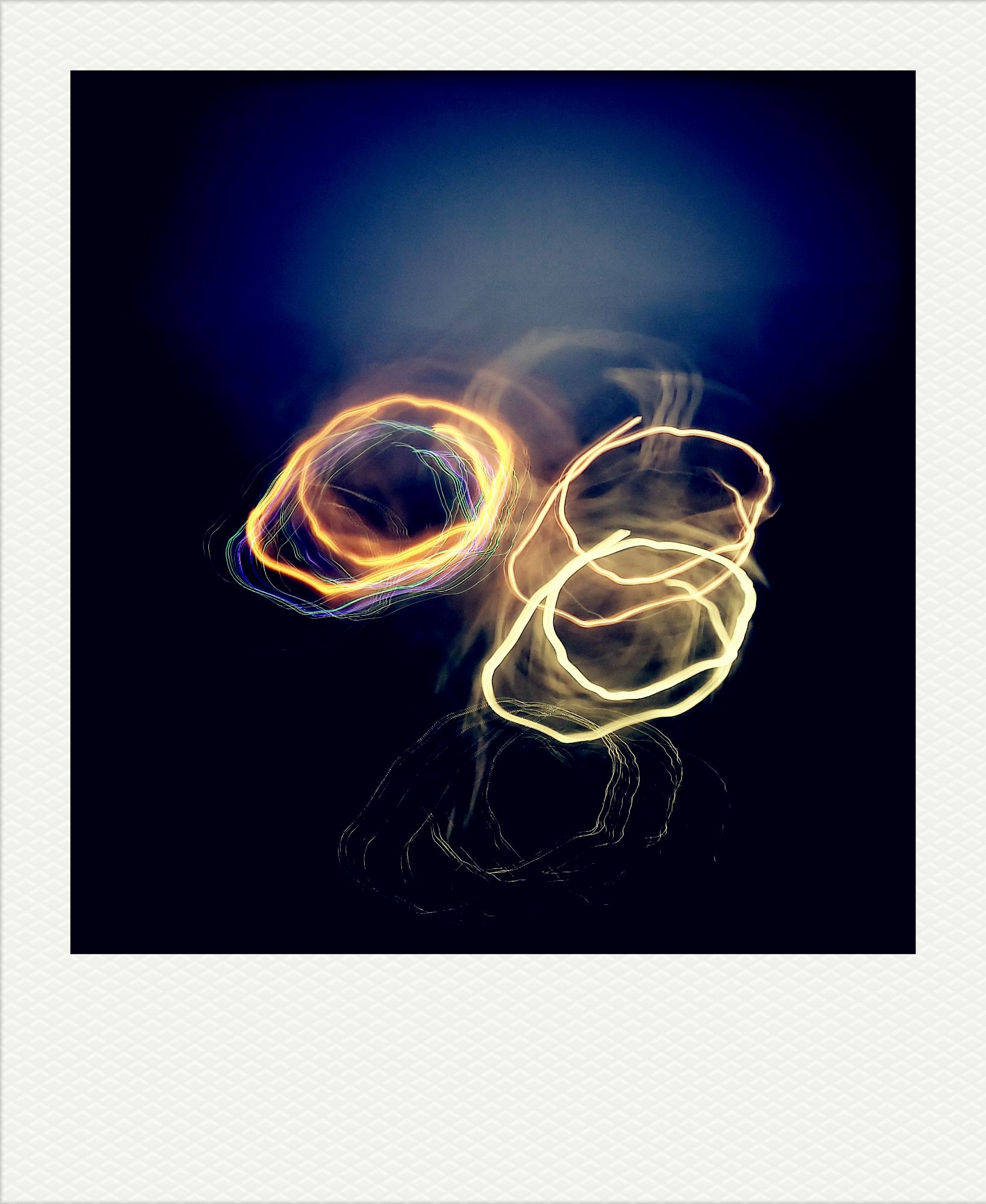 Traces of lights in the blueish night.